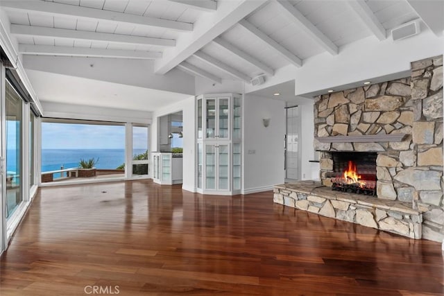 2016 Calle De Los Alamos, San Clemente, CA 92672 - unfurnished living room featuring a stone fireplace, hardwood / wood-style flooring, and plenty of natural light