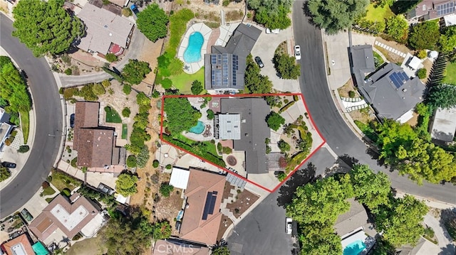 8601 Rudnick Ave, West Hills, CA 91304 - aerial view of residential area with a pool and property parcel outlined