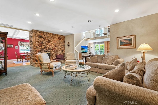 8601 Rudnick Ave, West Hills, CA 91304 - living room with recessed lighting, a fireplace, and carpet flooring