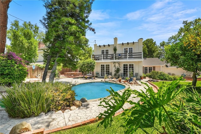 8601 Rudnick Ave, West Hills, CA 91304 - view of swimming pool featuring french doors and a patio