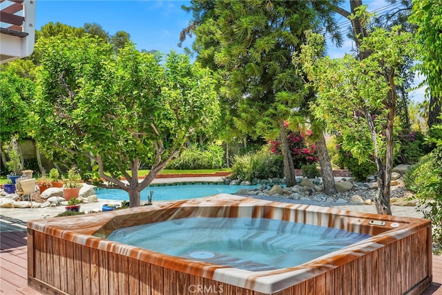 8601 Rudnick Ave, West Hills, CA 91304 - view of swimming pool featuring a hot tub and a wooden deck