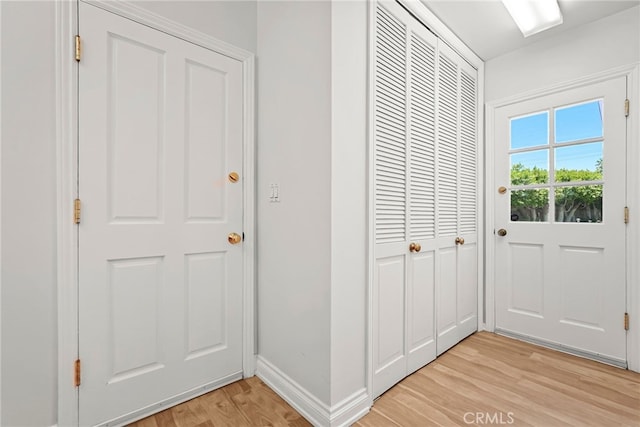 8601 Rudnick Ave, West Hills, CA 91304 - hallway featuring light wood-style floors and baseboards