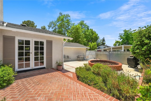 8601 Rudnick Ave, West Hills, CA 91304 - view of patio with a gate and french doors