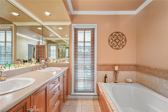 8601 Rudnick Ave, West Hills, CA 91304 - full bath featuring ornamental molding, a garden tub, double vanity, tile patterned flooring, and recessed lighting