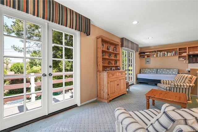 8601 Rudnick Ave, West Hills, CA 91304 - living room with french doors, light carpet, and recessed lighting