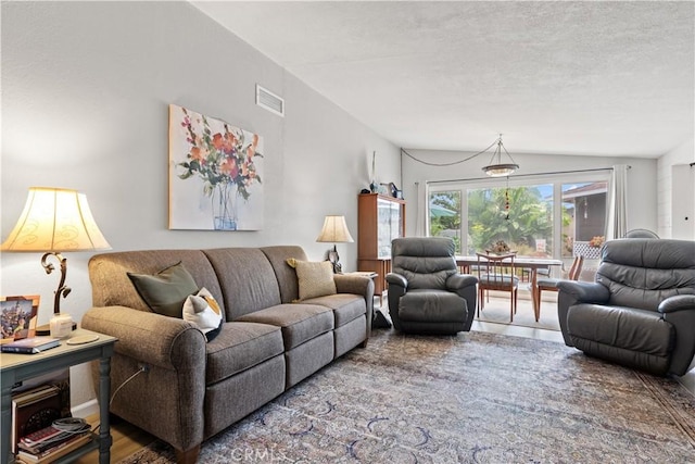 14091 Dall Ln, Tustin, CA 92780 - living area featuring a textured ceiling and wood finished floors
