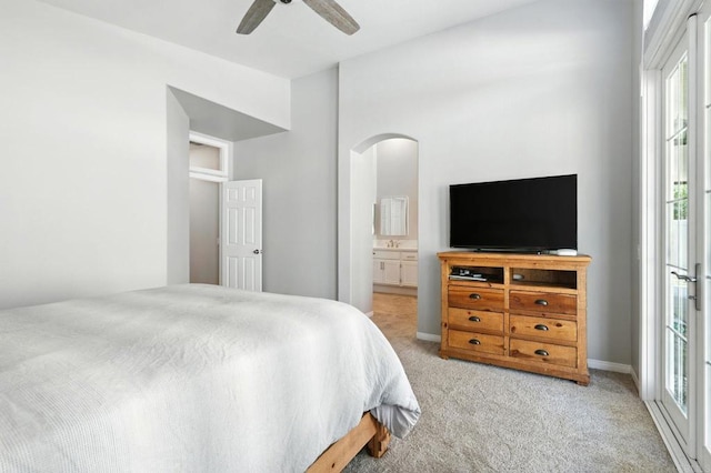46076 Via Ln, Colorada, Temecula, CA 92592 - bedroom featuring light colored carpet, multiple windows, arched walkways, and ensuite bathroom