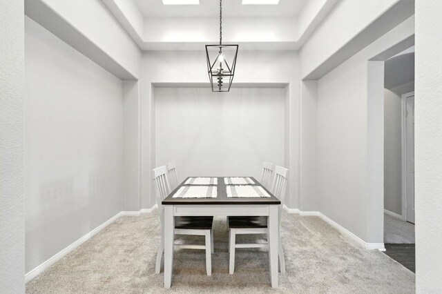 46076 Via Ln, Colorada, Temecula, CA 92592 - unfurnished dining area featuring carpet floors and a tray ceiling