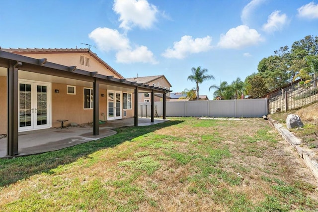 46076 Via Ln, Colorada, Temecula, CA 92592 - fenced backyard with french doors and a patio