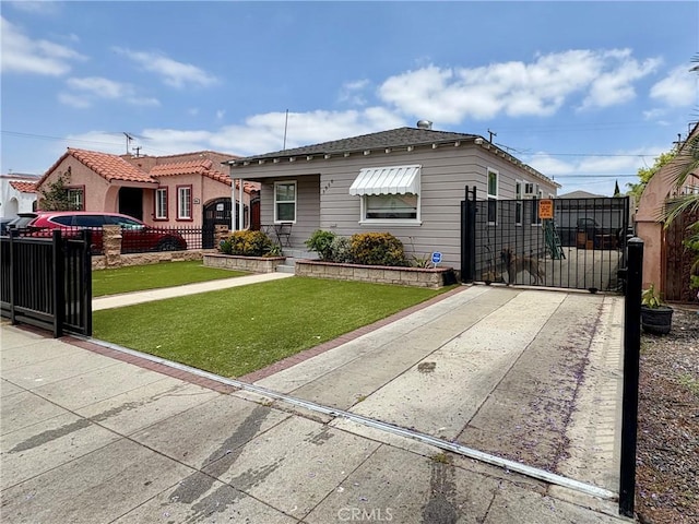 5960 Lime Ave, Long Beach, CA 90805 - view of front of property featuring a gate and concrete driveway