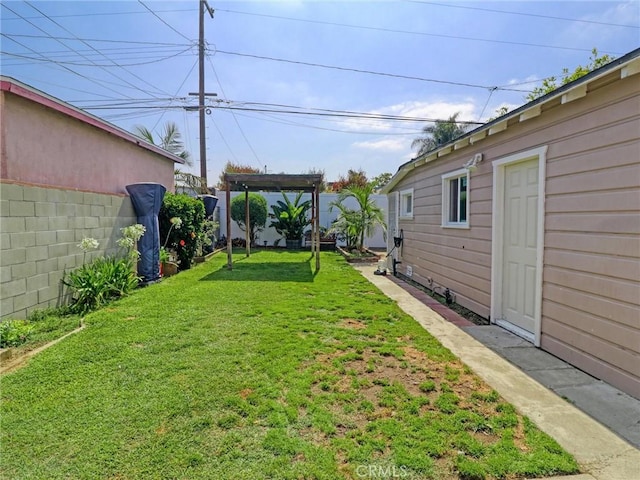 5960 Lime Ave, Long Beach, CA 90805 - fenced backyard featuring a pergola