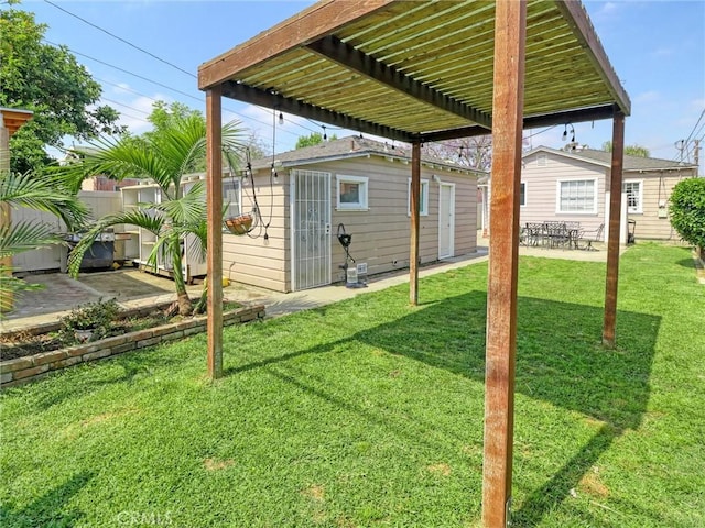 5960 Lime Ave, Long Beach, CA 90805 - view of grassy yard featuring a patio area and a pergola