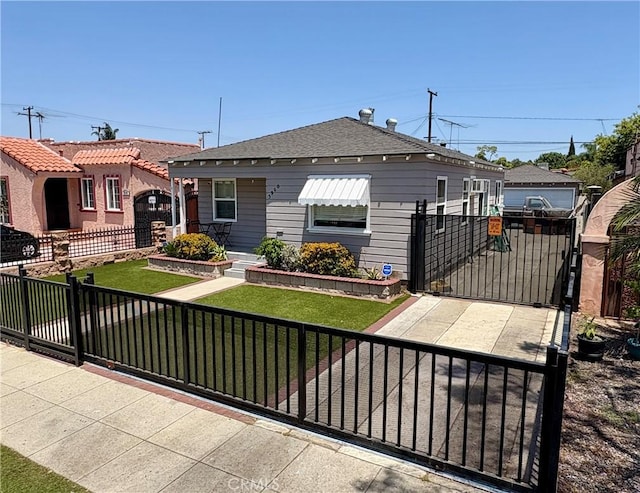 5960 Lime Ave, Long Beach, CA 90805 - view of front facade featuring a gate and a fenced front yard