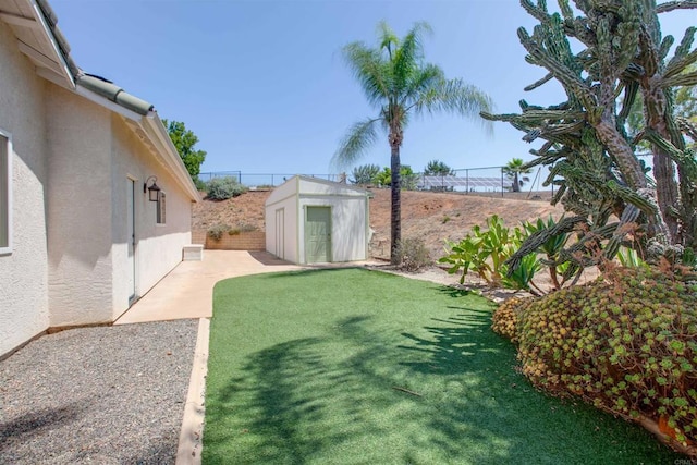 2149 Gamble Pl, Escondido, CA 92029 - fenced backyard with a storage shed and a patio area