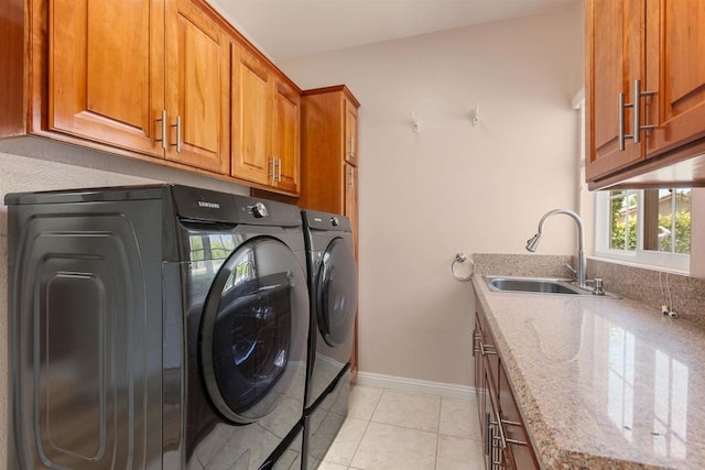 2149 Gamble Pl, Escondido, CA 92029 - washroom with cabinet space, washer and clothes dryer, and light tile patterned flooring