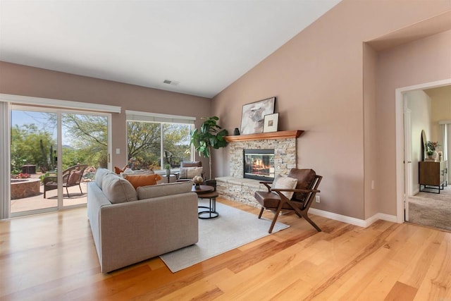 2149 Gamble Pl, Escondido, CA 92029 - living area with light wood-type flooring, a fireplace, and high vaulted ceiling