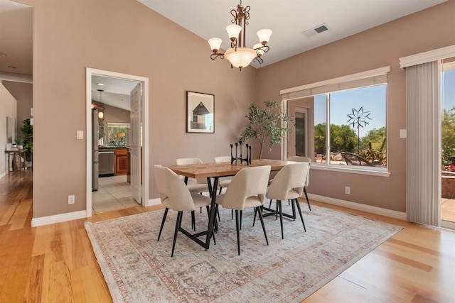 2149 Gamble Pl, Escondido, CA 92029 - dining space featuring light wood-style flooring and a chandelier