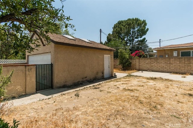 15300 Mayall St, San Fernando, CA 91345 - view of side of property featuring stucco siding