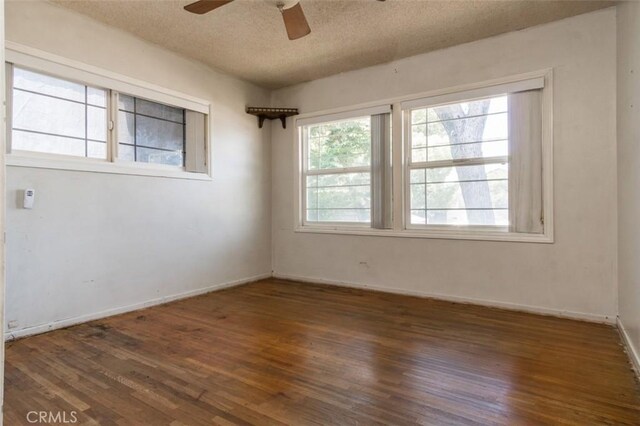 15300 Mayall St, San Fernando, CA 91345 - spare room featuring a ceiling fan, a textured ceiling, and wood finished floors