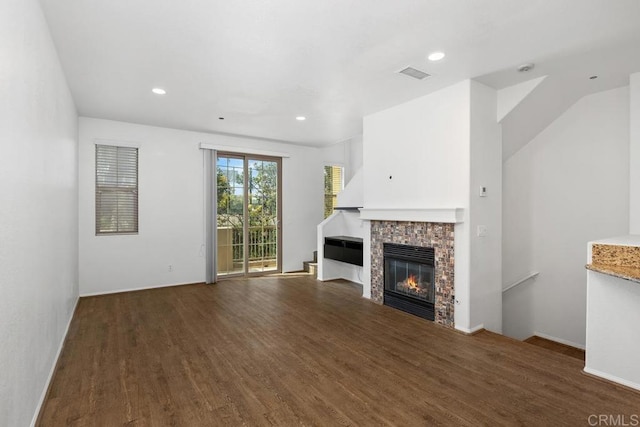 1837 Olive Green St Unit 3, Chula Vista, CA 91913 - unfurnished living room featuring wood finished floors, a glass covered fireplace, and recessed lighting