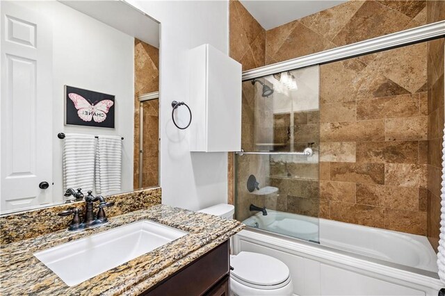 289 23rd St, Costa Mesa, CA 92627 - full bathroom featuring vanity and combined bath / shower with glass door