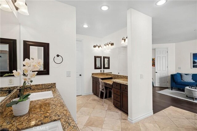 289 23rd St, Costa Mesa, CA 92627 - full bathroom featuring two vanities, recessed lighting, and tile patterned floors