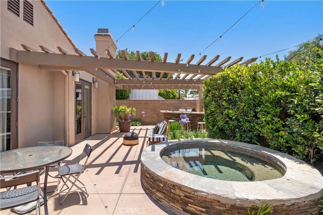 289 23rd St, Costa Mesa, CA 92627 - view of patio / terrace featuring an in-ground hot tub, a pergola, and outdoor dining space