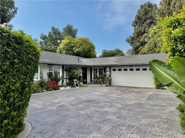 26767 Shadow Wood Dr, Rancho Palos Verdes, CA 90275 - ranch-style home with a garage, driveway, and a shingled roof