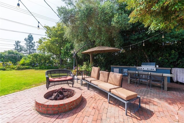 26767 Shadow Wood Dr, Rancho Palos Verdes, CA 90275 - view of patio / terrace with a grill, an outdoor living space with a fire pit, view of wooded area, and outdoor dining space