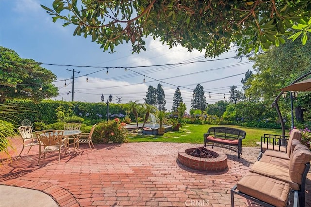 26767 Shadow Wood Dr, Rancho Palos Verdes, CA 90275 - view of patio with outdoor dining space and an outdoor living space with a fire pit