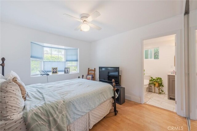 26767 Shadow Wood Dr, Rancho Palos Verdes, CA 90275 - bedroom with light wood-type flooring, ensuite bathroom, and ceiling fan