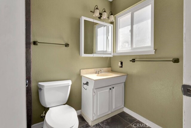 10723 Portland Ave, Hesperia, CA 92345 - bathroom with toilet and vanity
