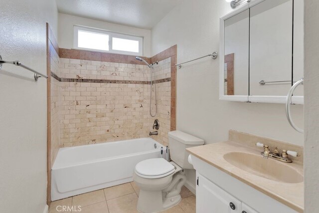 10723 Portland Ave, Hesperia, CA 92345 - full bath with shower / bath combination, vanity, and tile patterned flooring