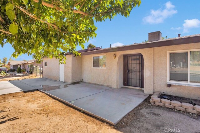 10723 Portland Ave, Hesperia, CA 92345 - view of front of home with a patio area and stucco siding