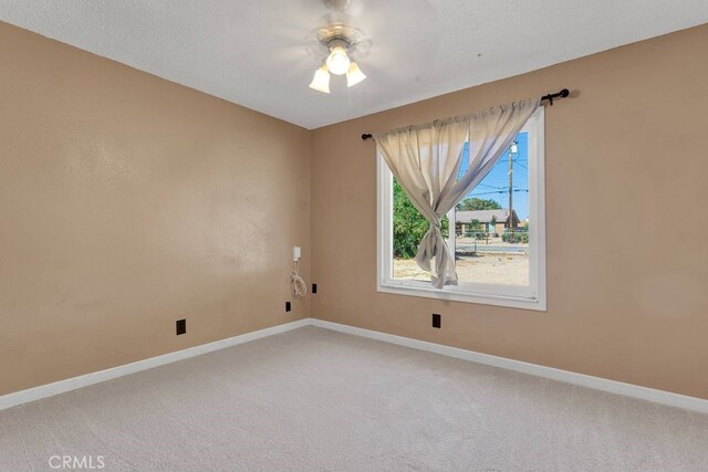 10723 Portland Ave, Hesperia, CA 92345 - carpeted empty room featuring baseboards and ceiling fan