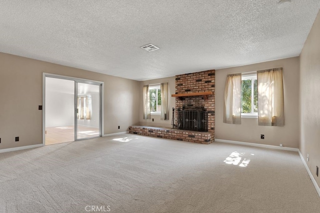 10723 Portland Ave, Hesperia, CA 92345 - unfurnished living room with a fireplace, carpet, and a textured ceiling