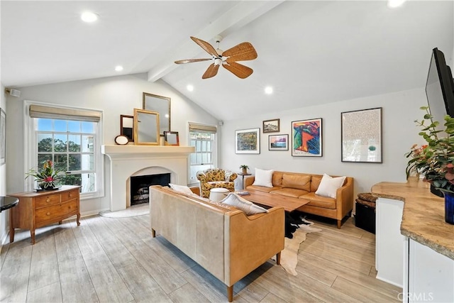 11832 Weatherby Rd, Los Alamitos, CA 90720 - living area with a ceiling fan, light wood-style floors, recessed lighting, and a fireplace with raised hearth