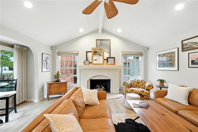 11832 Weatherby Rd, Los Alamitos, CA 90720 - living room with plenty of natural light, ceiling fan, light wood-type flooring, recessed lighting, and arched walkways