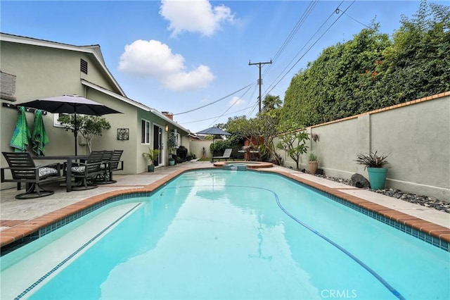 11832 Weatherby Rd, Los Alamitos, CA 90720 - view of swimming pool featuring a fenced backyard, a patio area, and a pool with connected hot tub