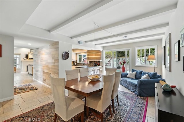 11832 Weatherby Rd, Los Alamitos, CA 90720 - dining area featuring plenty of natural light, beam ceiling, and recessed lighting
