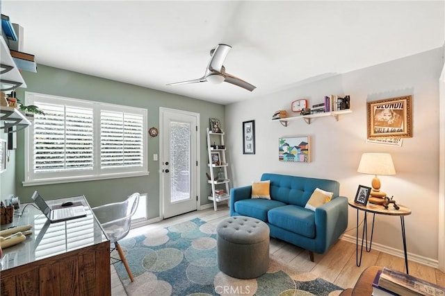 11832 Weatherby Rd, Los Alamitos, CA 90720 - living area with wood finished floors and ceiling fan