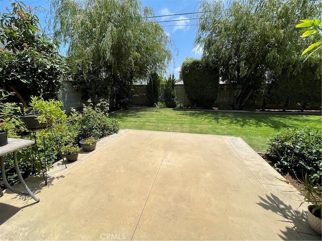 2068 Radnor Ave, Long Beach, CA 90815 - fenced backyard with a patio