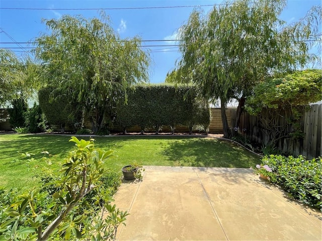 2068 Radnor Ave, Long Beach, CA 90815 - fenced backyard featuring a patio
