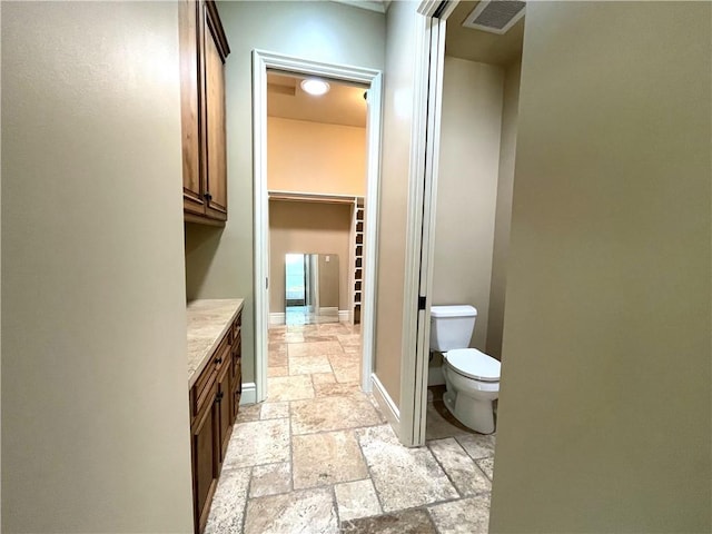 2068 Radnor Ave, Long Beach, CA 90815 - bathroom featuring stone tile flooring and vanity