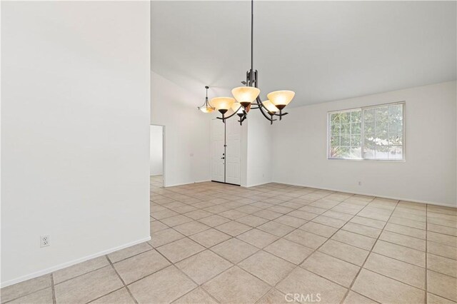 42158 Valley Vista Dr, Lancaster, CA 93536 - empty room featuring a chandelier, vaulted ceiling, and light tile patterned flooring