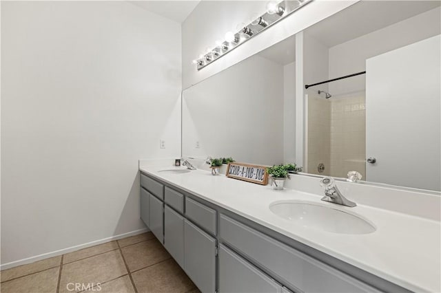 42158 Valley Vista Dr, Lancaster, CA 93536 - bathroom with double vanity, tile patterned flooring, and a shower