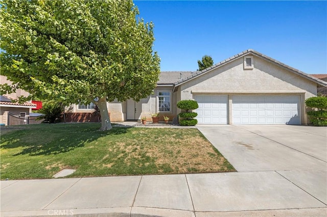 42158 Valley Vista Dr, Lancaster, CA 93536 - ranch-style house featuring an attached garage, concrete driveway, stucco siding, a front lawn, and a tiled roof