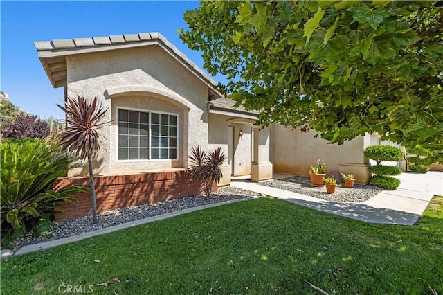 42158 Valley Vista Dr, Lancaster, CA 93536 - view of front of property with stucco siding and a front yard