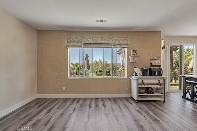 19639 Ellis Henry Ct, Newhall, CA 91321 - living room featuring wood finished floors and healthy amount of natural light