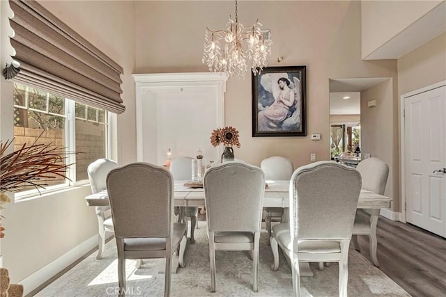 19639 Ellis Henry Ct, Newhall, CA 91321 - dining space featuring plenty of natural light, a chandelier, and wood finished floors